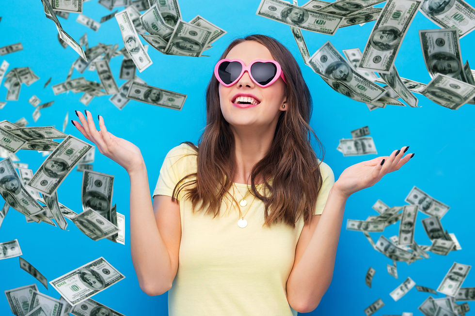 smiling young woman or teenage girl in yellow t-shirt and heart-shaped sunglasses over dollar money rain on bright blue background