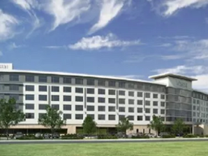 TRINITY PURCHASES LAND IN SOUTHLAKE FOR HOTEL DEVELOPMENT
