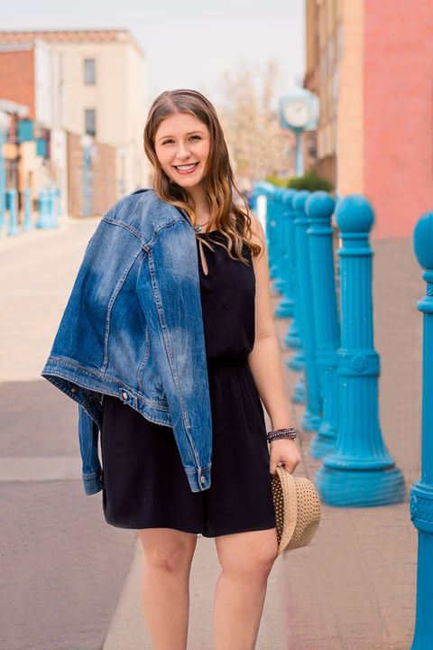 A South Fayette Senior Girl posing with a denim jacket and a hat