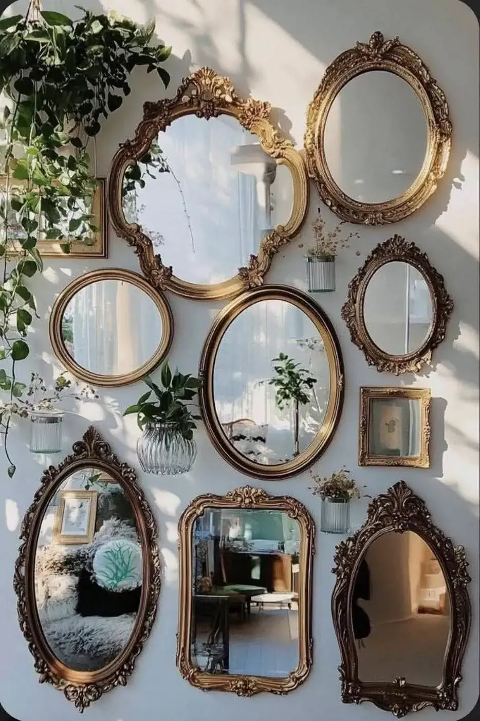 Close-up view of a round gold-framed mirror above a minimalist console table