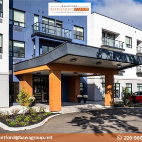 Modern exterior of Brantford Retirement Manor featuring a covered entrance, blue accents, and private glass balconies.
