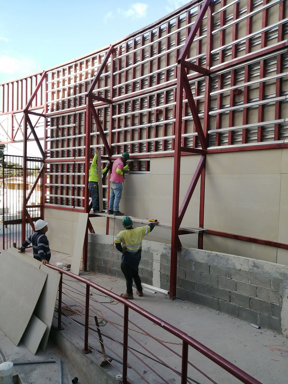 Colocación de paneles TABLATEK en trasdosado de fachada