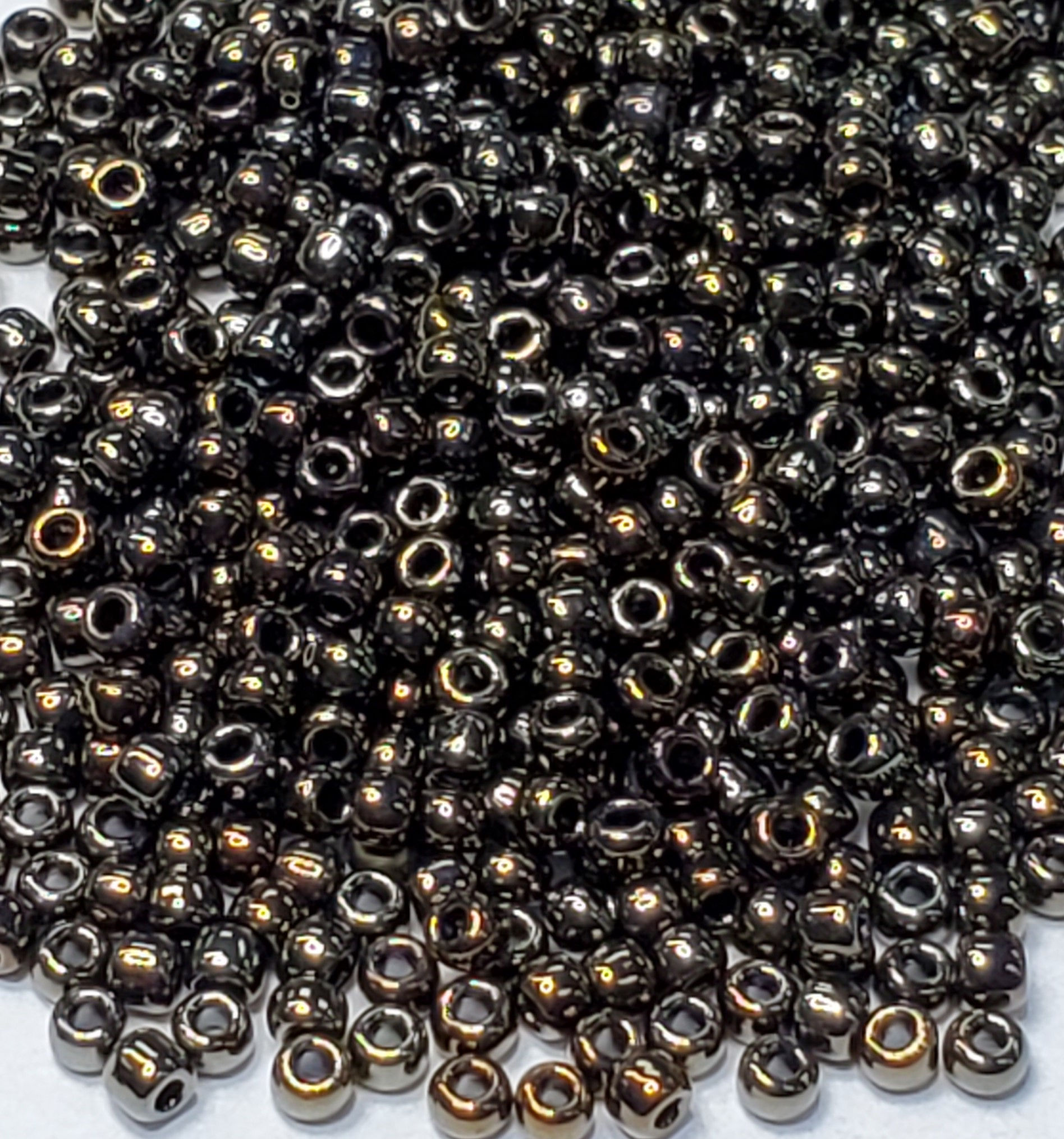 11-83 Metallic Iris Brown Toho Size 11