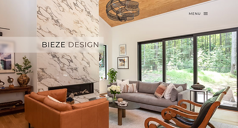 Modern living room by Bieze Design with marble fireplace