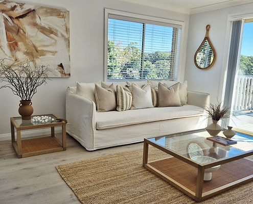Property styling for a Central Coast home featuring soft neutral furnishings and strategically presented living spaces