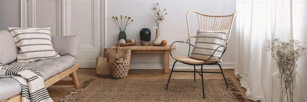 Ratan rug with cane occasional chairs and coastal homewares