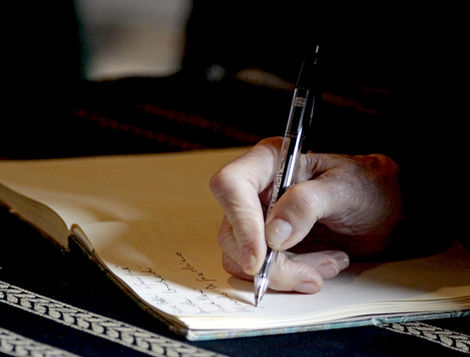 Unreliable narrator writing distorted truth in a mystery novel.