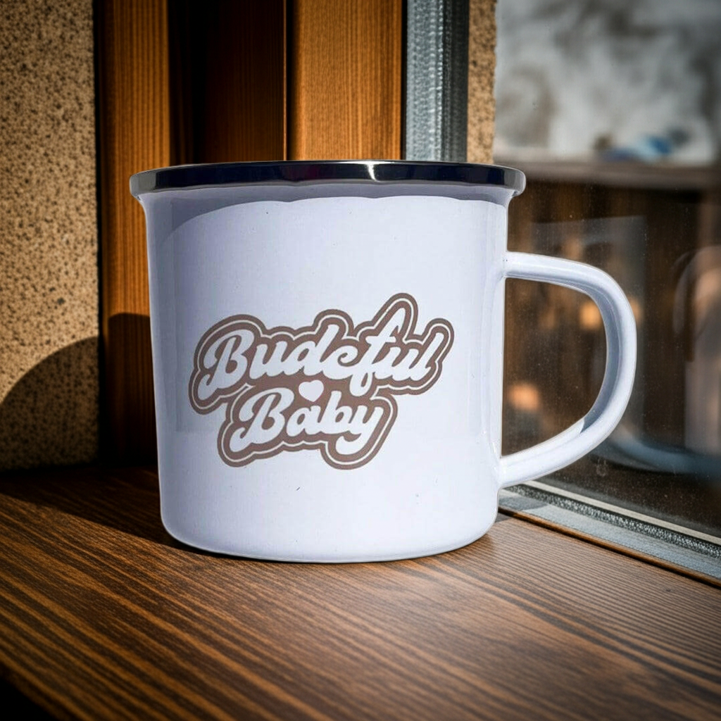 Budeful Baby unisex enamel mug with heart and baby feet logo designed in Cornwall