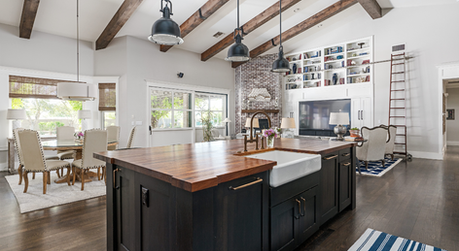 Brand new kitchen remodel with hardwood floors and island countertop