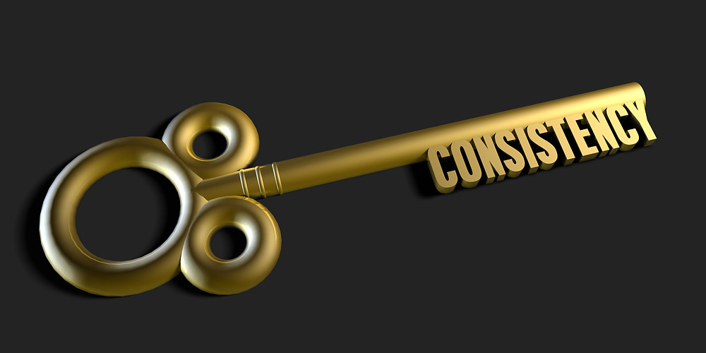 A key that forms the word "consistency" on the end.