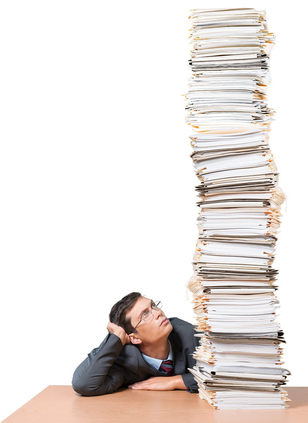 Human Resources Manager looks at a huge stack of resumes.