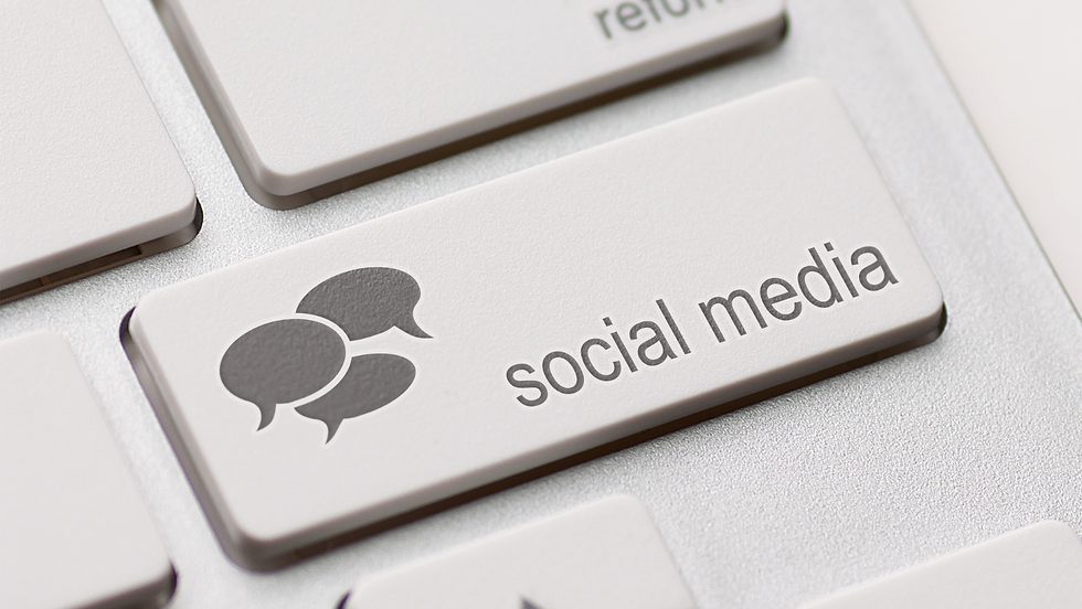 Small business owner reviewing social media performance with guidance from Digital Docent Consulting.