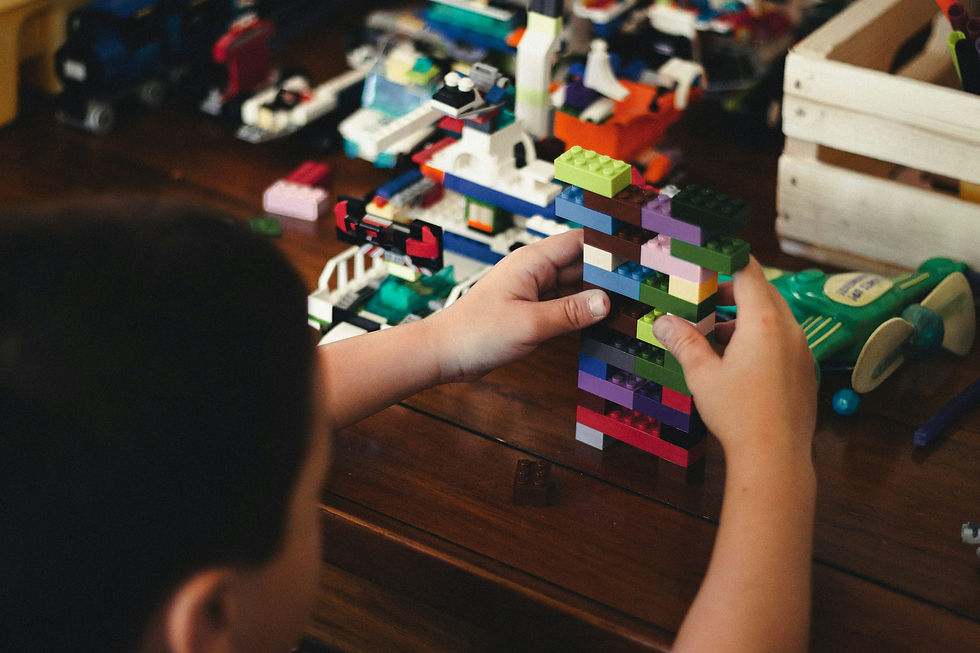 A child playing with LEGO blocks