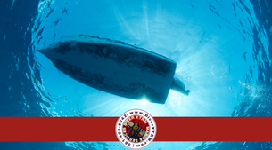 Yacht hull underwater with heavy marine growth, highlighting the need for South Florida hull cleaning, diver inspections, zinc replacement, and underwater maintenance by DiverXTRM Marine Services.