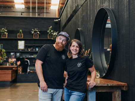 A couple looking getting their photo taken.