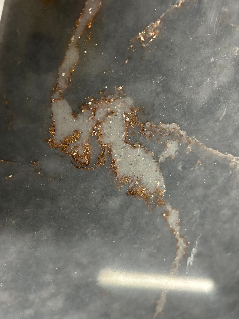 Showing a close up of the gold vein running through