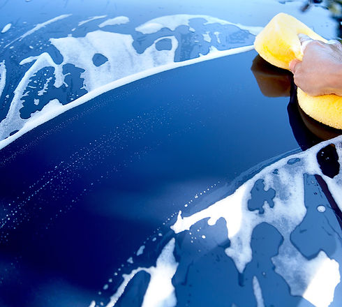 Blue car being washed