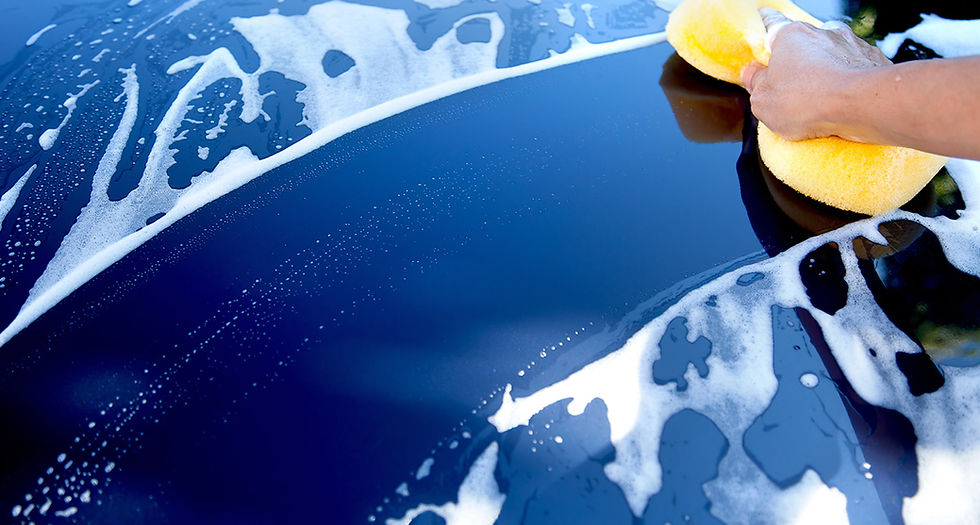 Blue car being washed