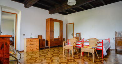 Gasthuis; slaapkamer; gastenkamer; Schilderretraite; retraite; italië; schildervakantie Italië; christelijke retraite; stilte; bezinning; schilderen; noord Italië; comomeer