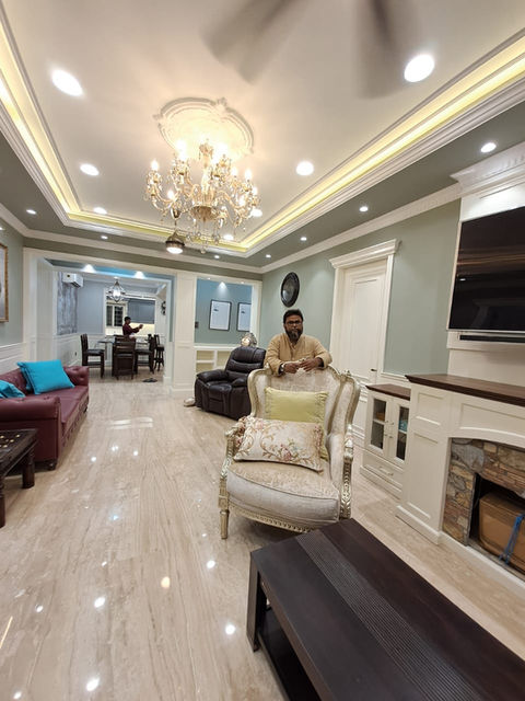 British-inspired living room with Victorian details and customised furniture designed by AMZ Interiors for Mr. Raheel Khan.