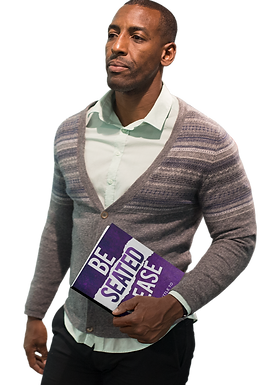 man-holding-a-book-while-walking-through-an-office-mockup-a14509 (2) (1).png