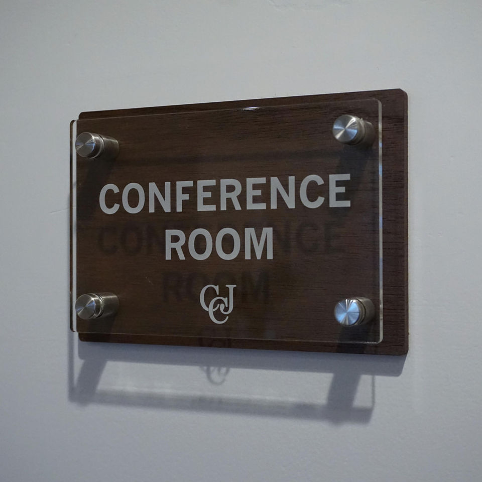 Critchfield, Critchfield & Johnston Walnut with Acrylic Standoff Room Sign.jpg