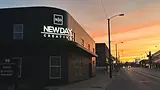 New Day Creative Building and Signage during sunset_edited.webp