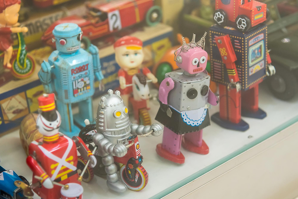Display of vintage toy robots and classic toys