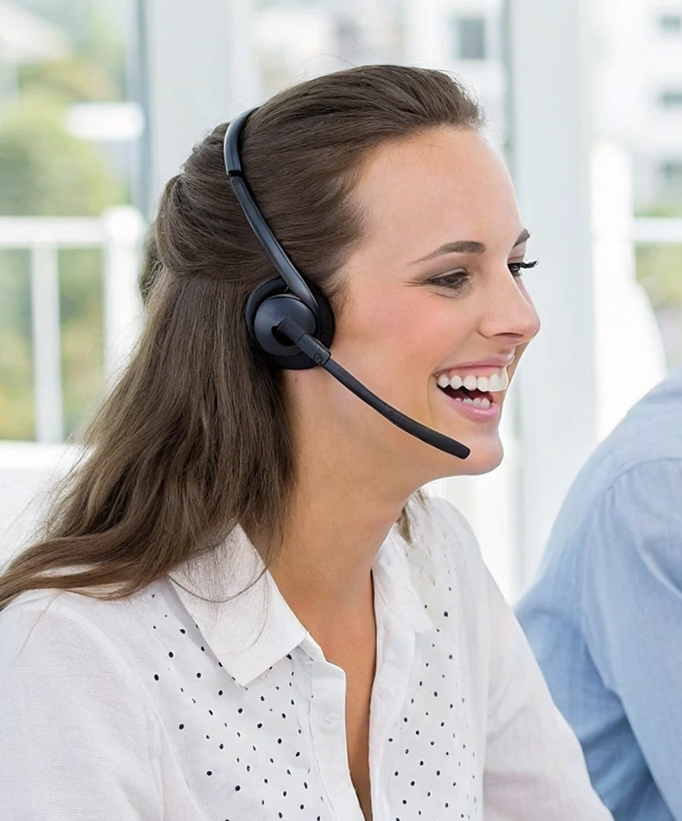 Woman smiling with headset for customer support