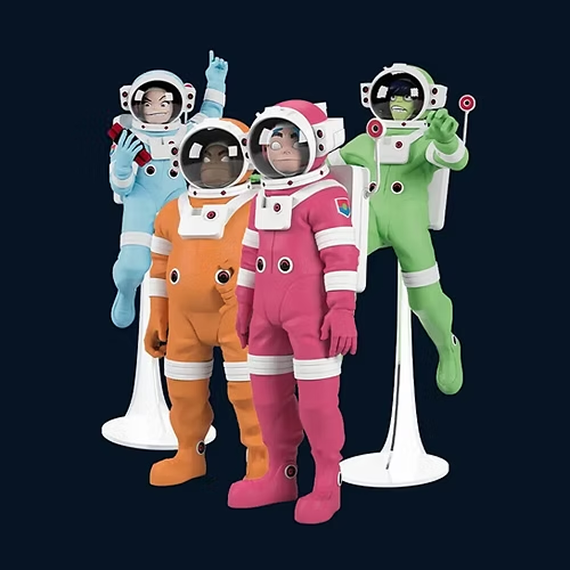 Unbox Industries Supersized astronaut figures: blue, orange, pink, green