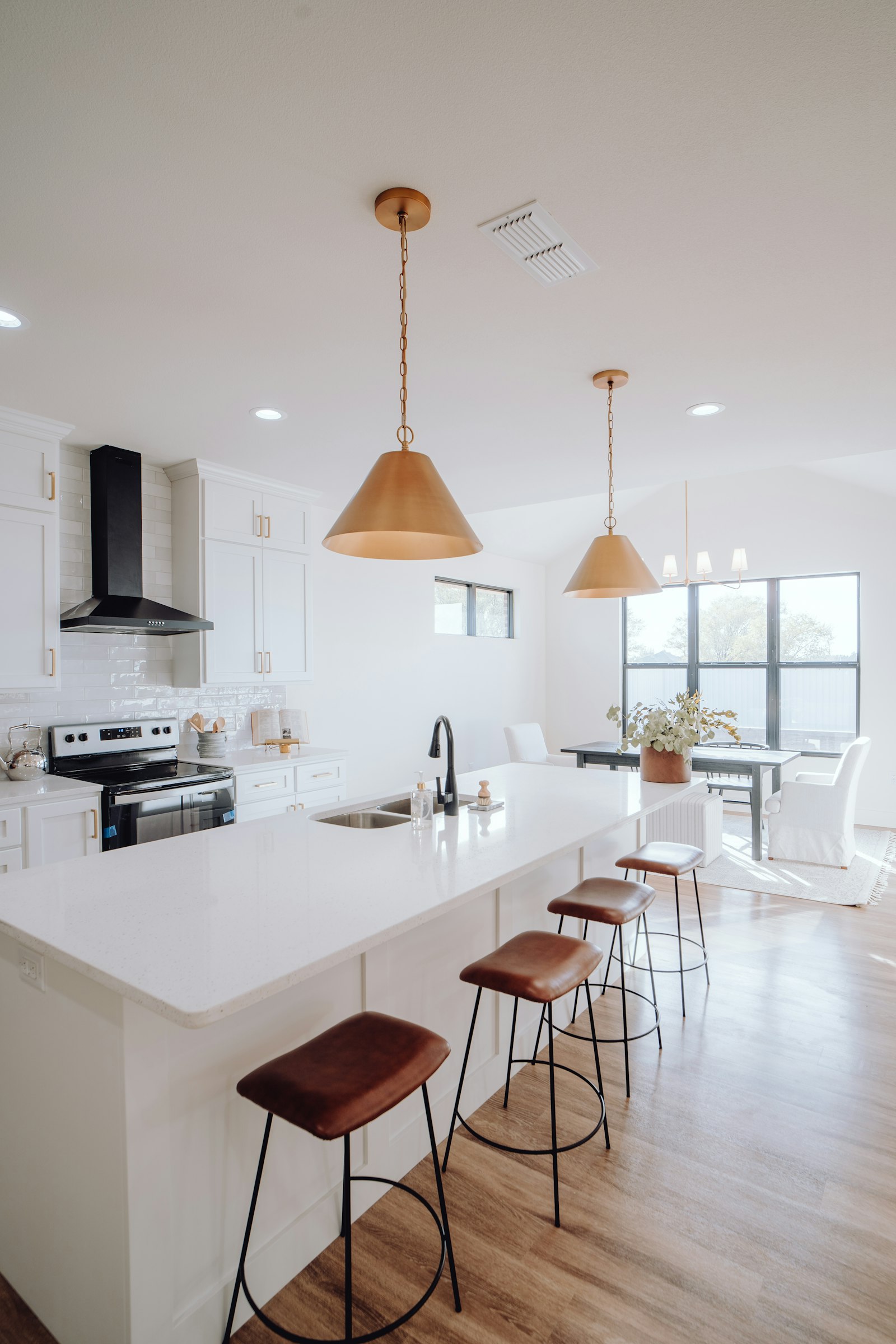 Large kitchen with a center island and bar stool seating