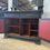 Thumbnail: Large Black Painted Dresser with Mirror, Gold Leaf & Carving Detail