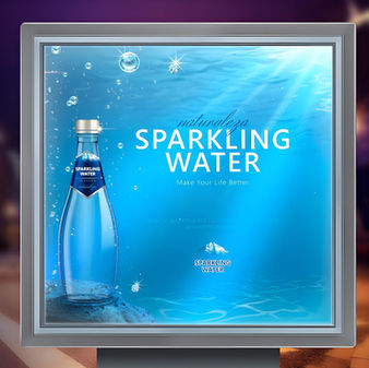 Square lightbox backlit sign featuring a sparkling water bottle graphic against a blue background.
