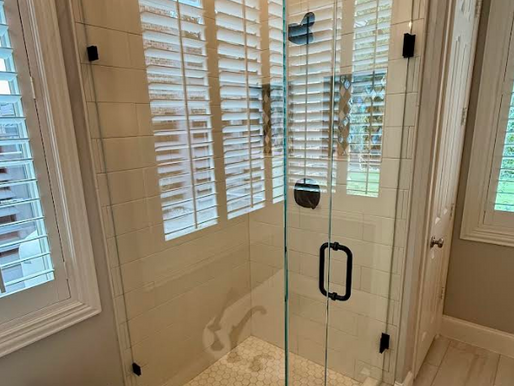 3-panel custom Starphire frameless shower glass enclosure with matte black hardware in Frisco TX