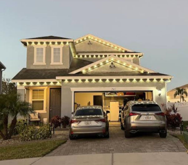 Completed installation of Govee permanent Christmas lights on a Wesley Chapel home, professionally mounted by a handyman Dade City service for a clean, seamless nighttime glow.