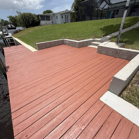 Beautiful boat dock after pressure washing and staining
