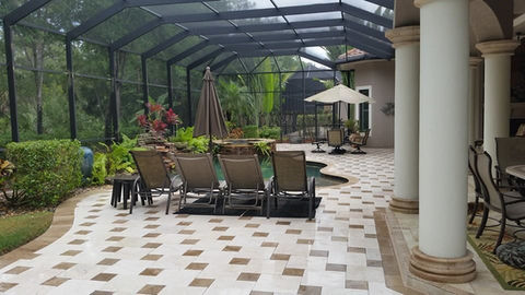Pool patio pavers in Cape Coral, showcasing the need for cleaning.