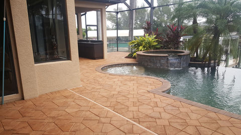 Image of pool patio deck pavers in Cape Coral before cleaning.