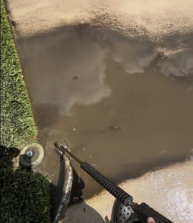 Driveway Swale Cleaning with Sludge Sucker