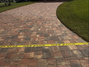 Driveway, entryway, and pool patio restored with professional cleaning and Paver Sealing Cape Coral services by AAA Pressure Washing, showing vibrant, protected paver surfaces.