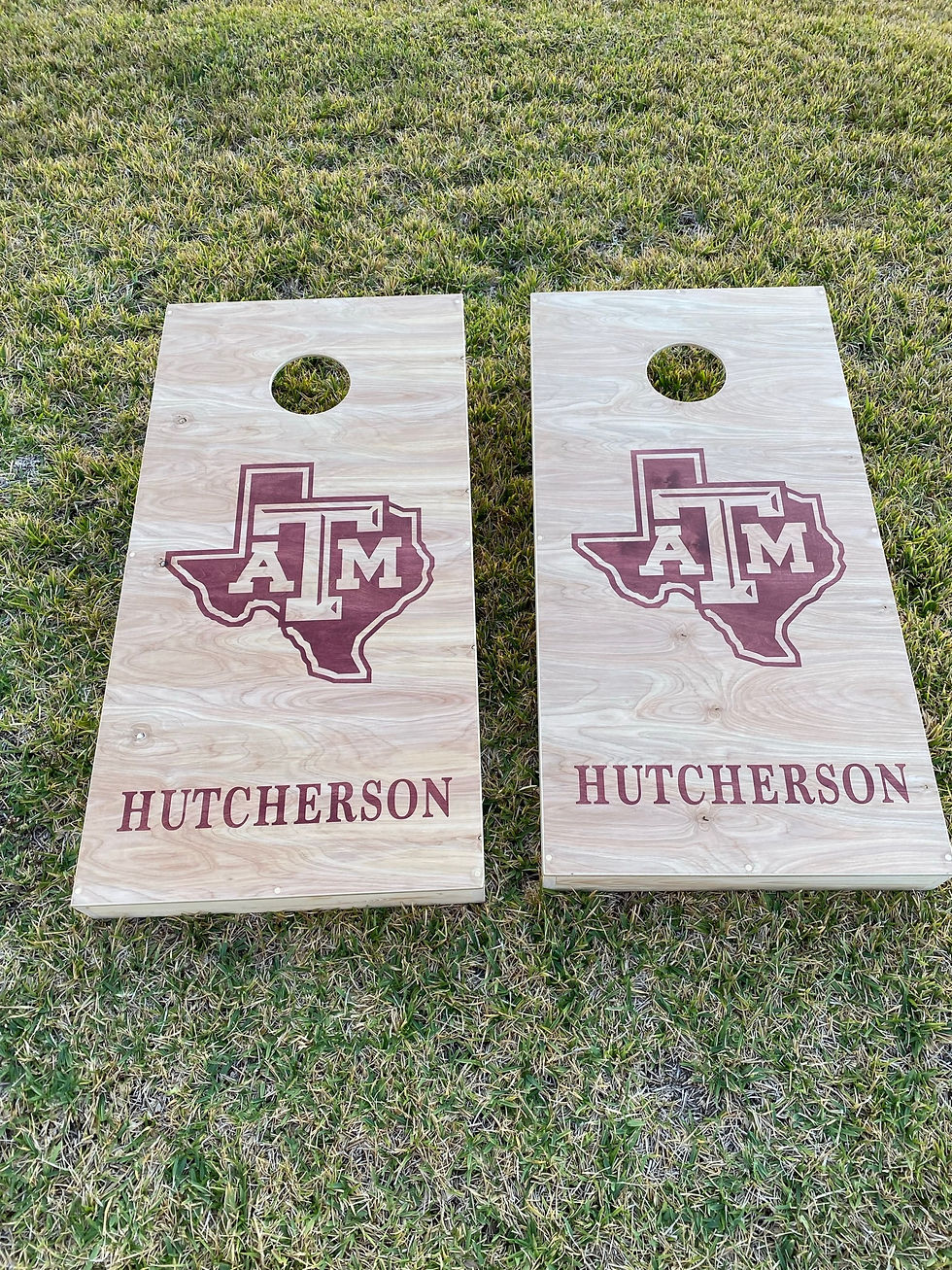 Corn hole board with Texas A&M Logo and custom name at the bottom