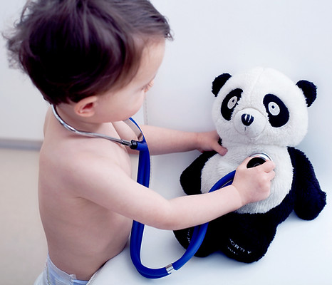 Child with panda toy