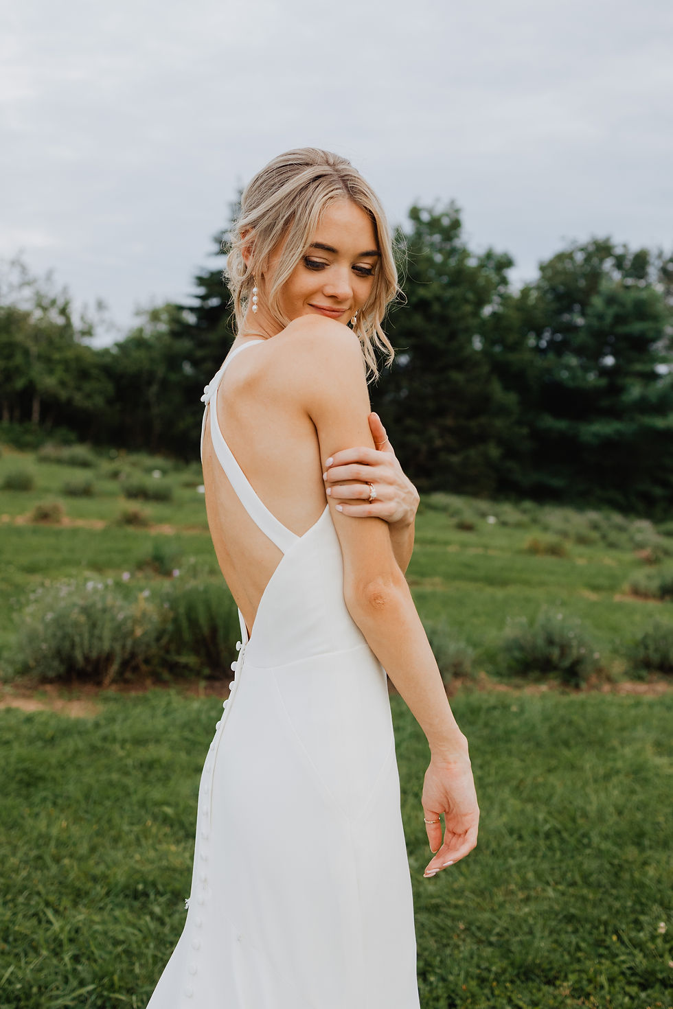wedding makeup artist, wedding hairstylist, bridal makeup inspo, bridal hair inspo, wedding updo inspo, bridal bun inspo, low bun, natural makeup, halifax weddings, south shore weddings, makeup artist halifax, wedding hair halifax, nova scotia weddings, farm at south cove weddings