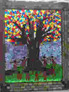 stained glass mosaic of a tree on a salvaged window