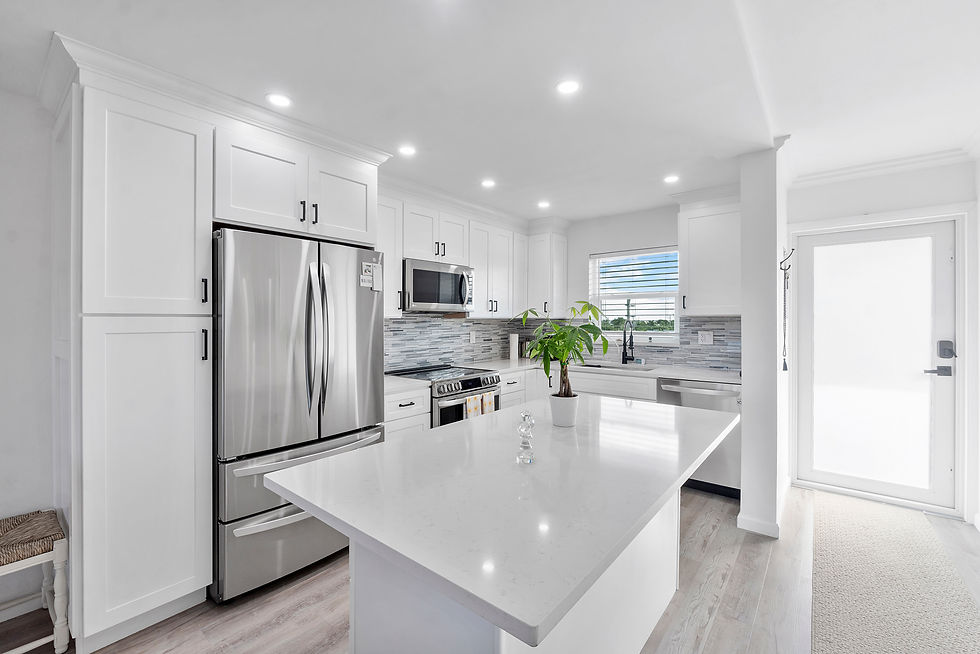 island kitchen with marble countertop