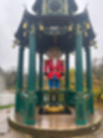 A full size nutcracker standing in a bandstand in the grounds of Cliveden House