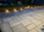 A patio at night showing the lighting.