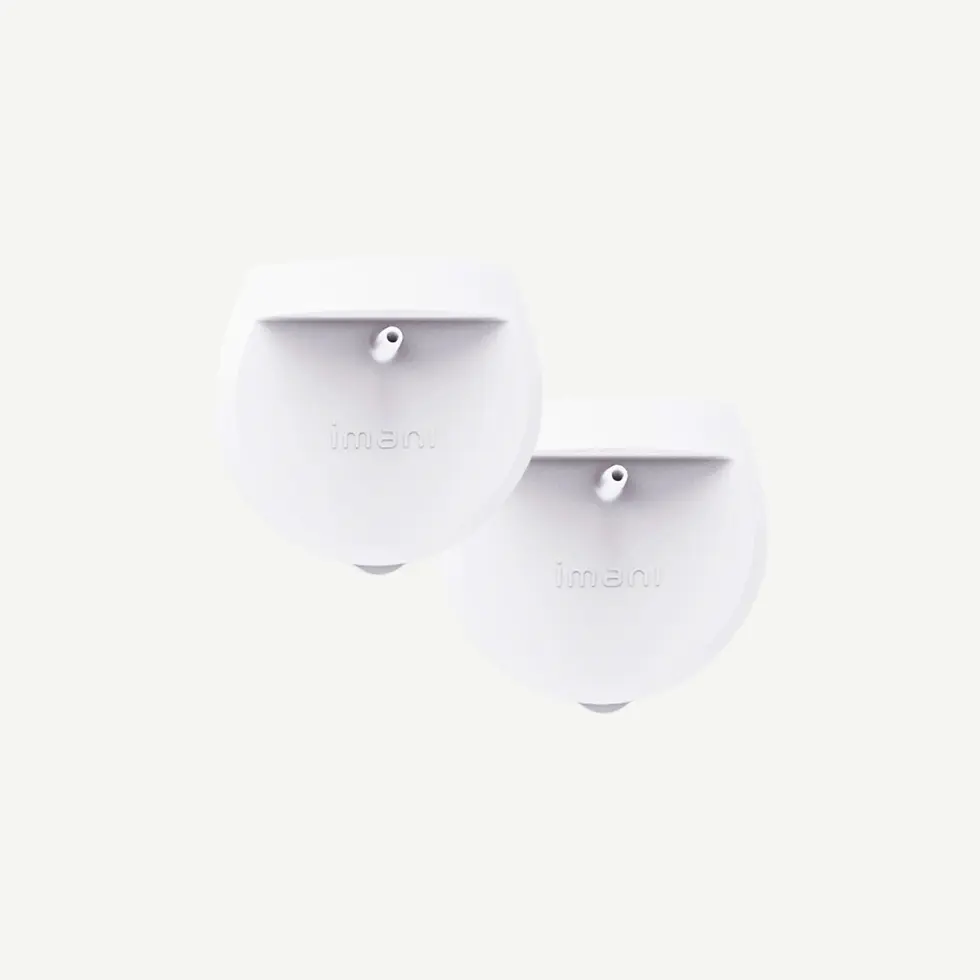 imani hands-free breast pump caps, compatible with hands-free cup, shown as a pair for dual-pumping setup.