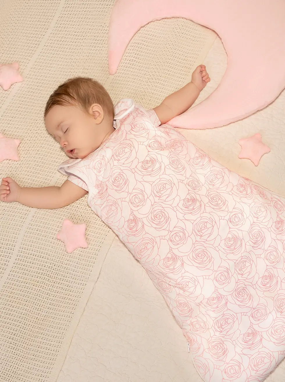 Baby sleeping in BambooBaby PinkRose 2.5 tog bamboo sleeping bag, showing fit and comfort during sleep