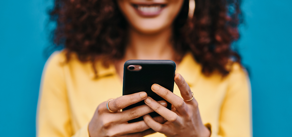 A woman on her phone scrolling social media